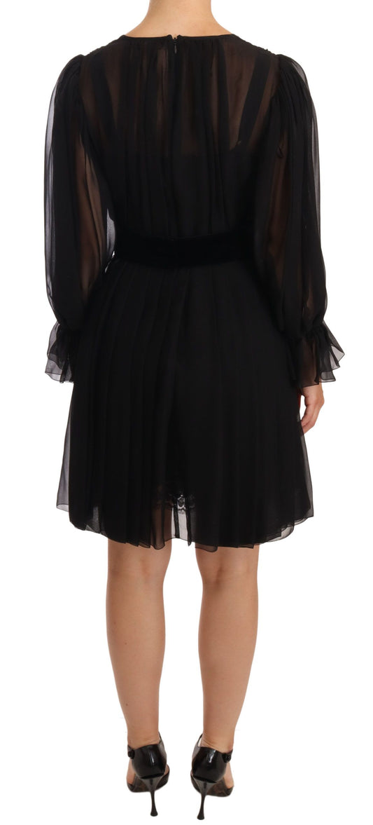 A black mesh pleated mini silk stretch dress by Dolce & Gabbana