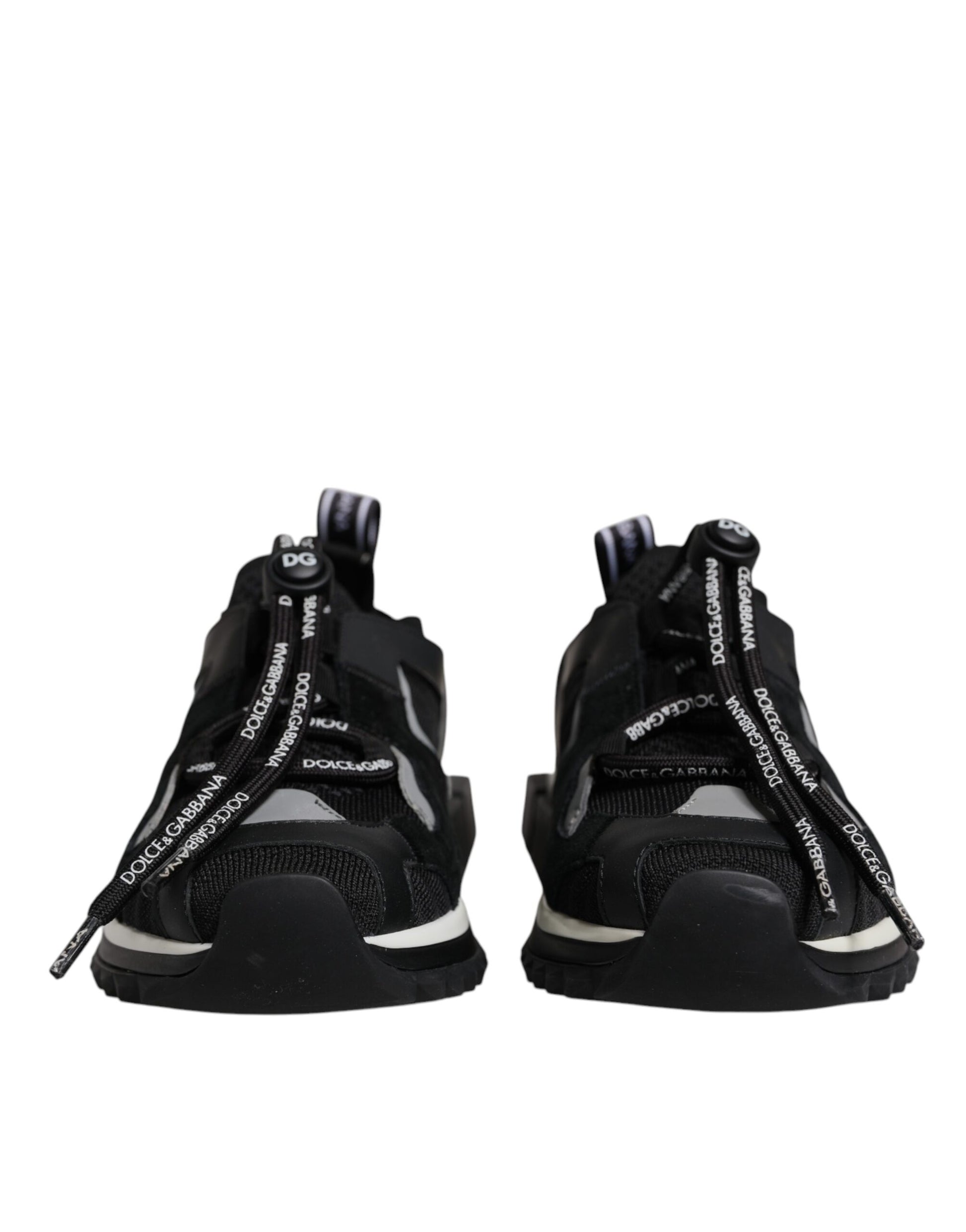 Pair of black sneakers with white laces and a zipper on top