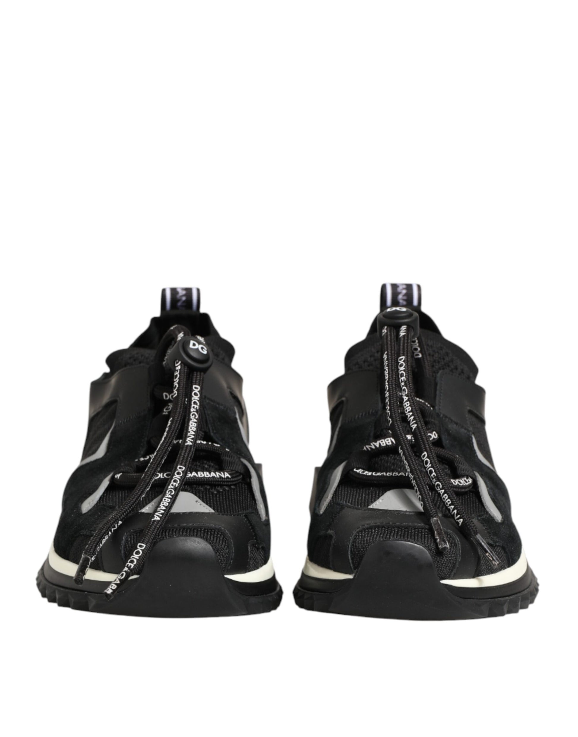 Pair of black and white sneakers with laces