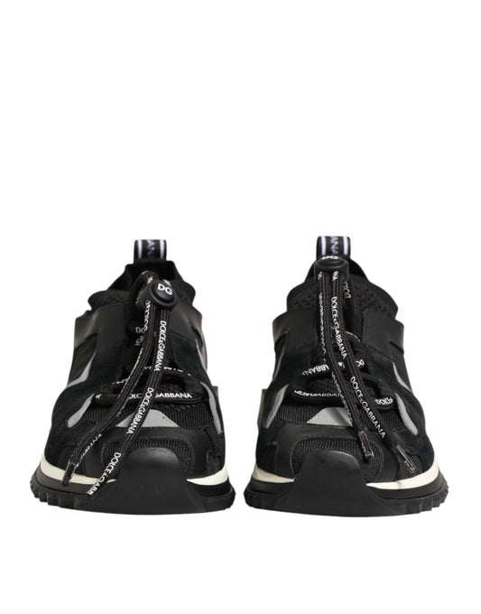 Pair of black and white sneakers with laces