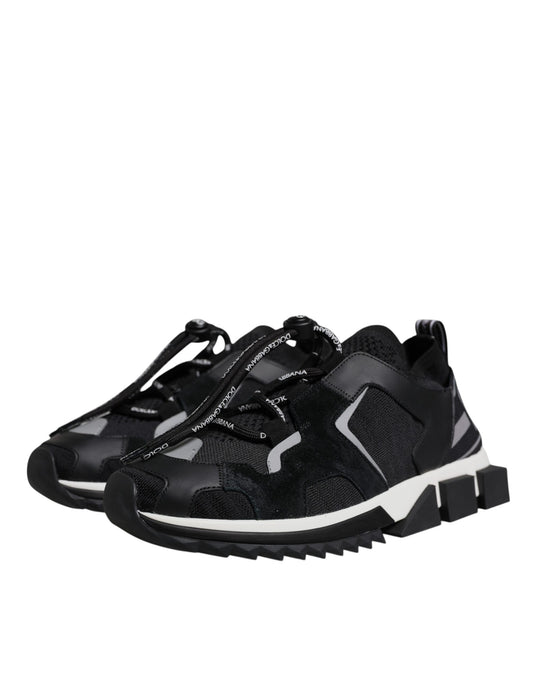 Black baby shoes with white soles