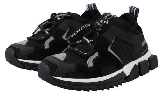 Pair of black and white sneakers with laces