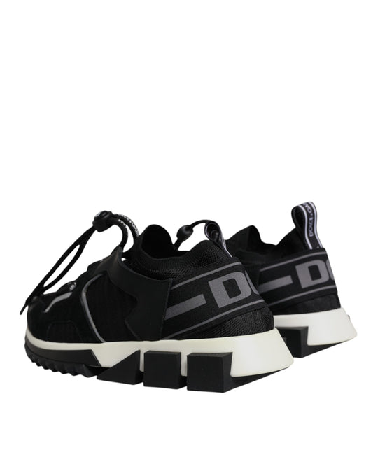 Pair of black and white sneakers with laces