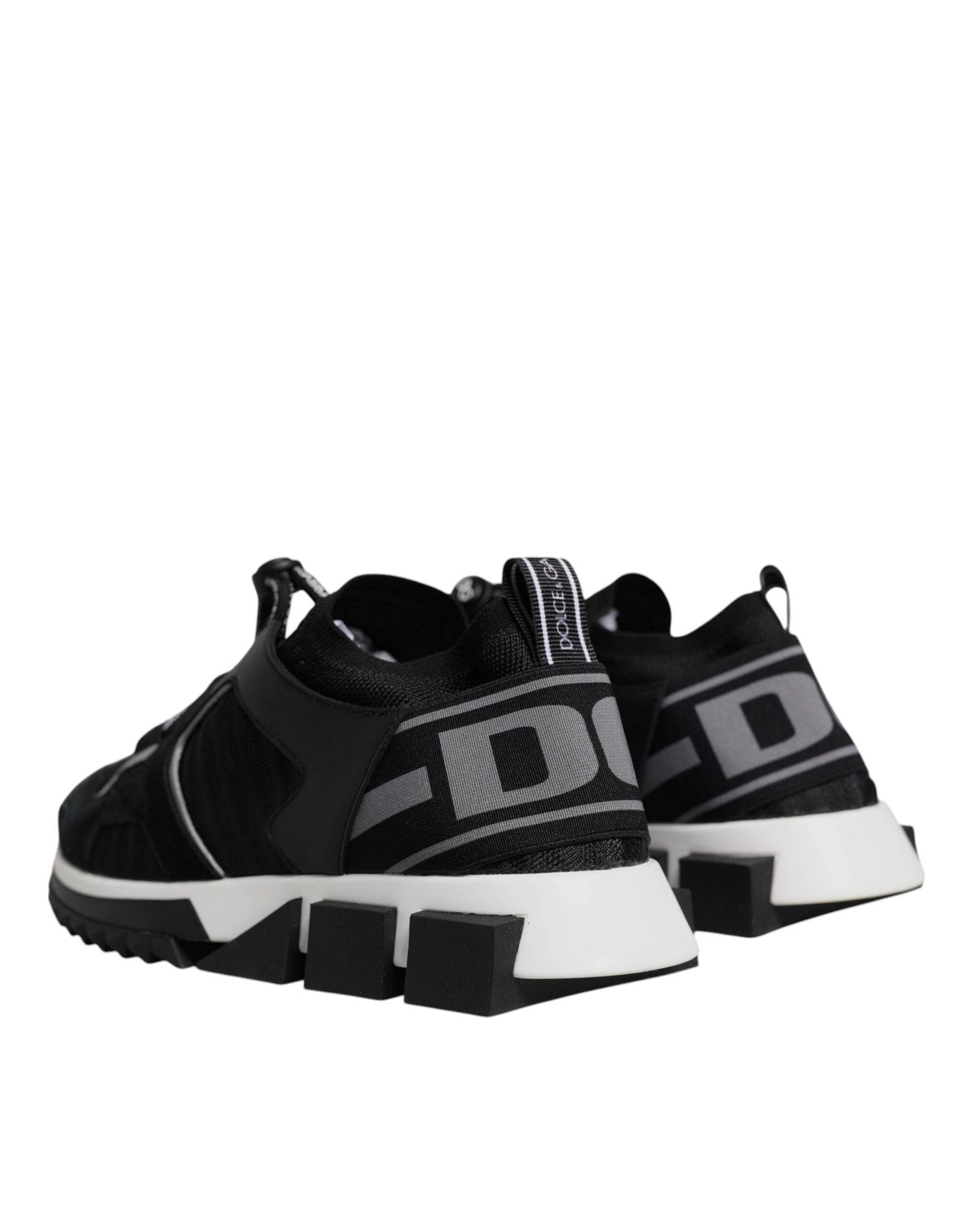 Pair of black and white sneakers for a baby