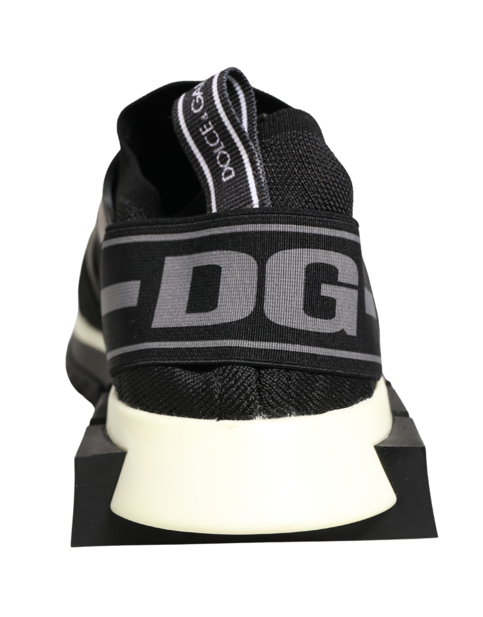 Black mesh sneakers with white sole, featuring brand name and design elements