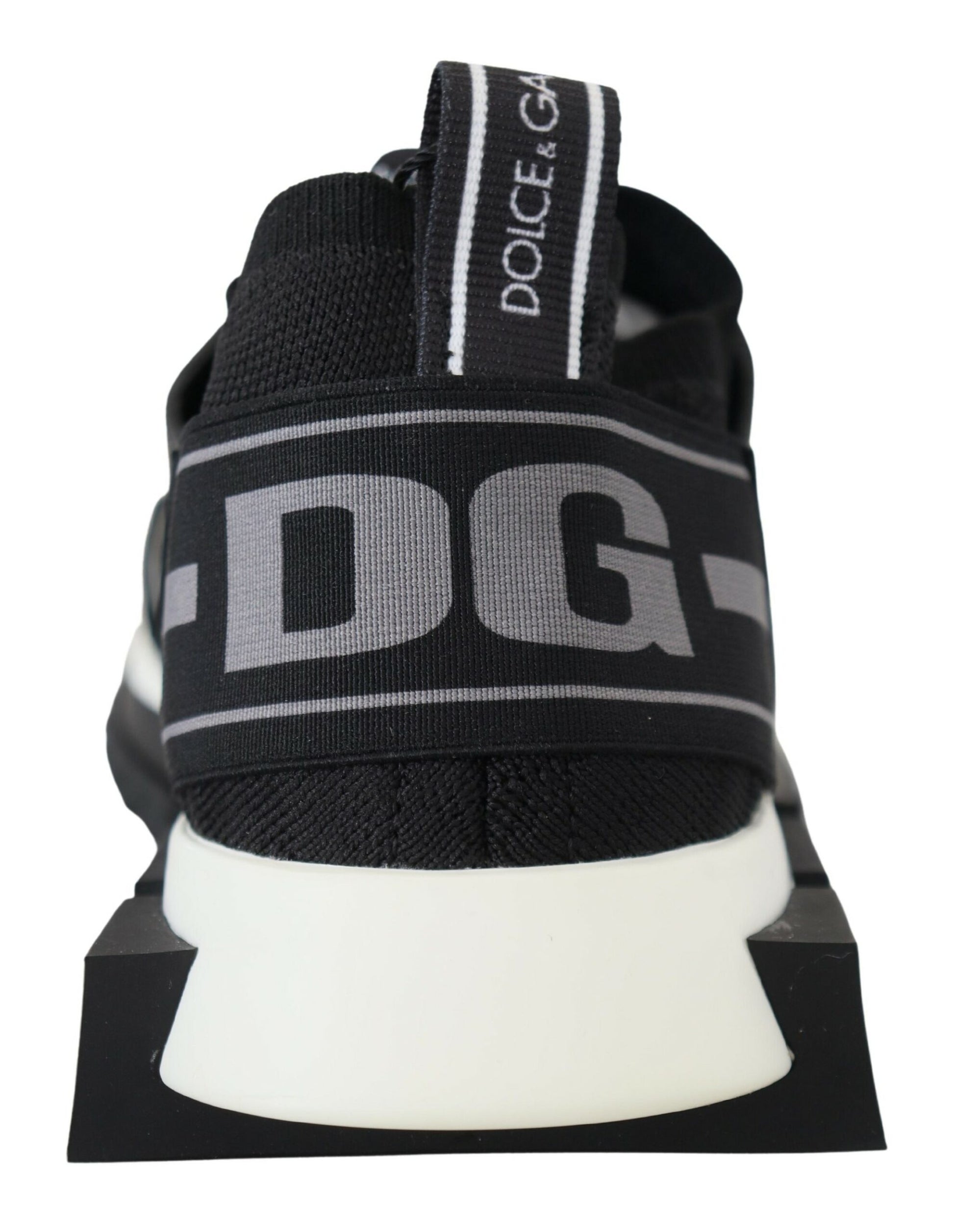 Black and white sneaker with brand name on side