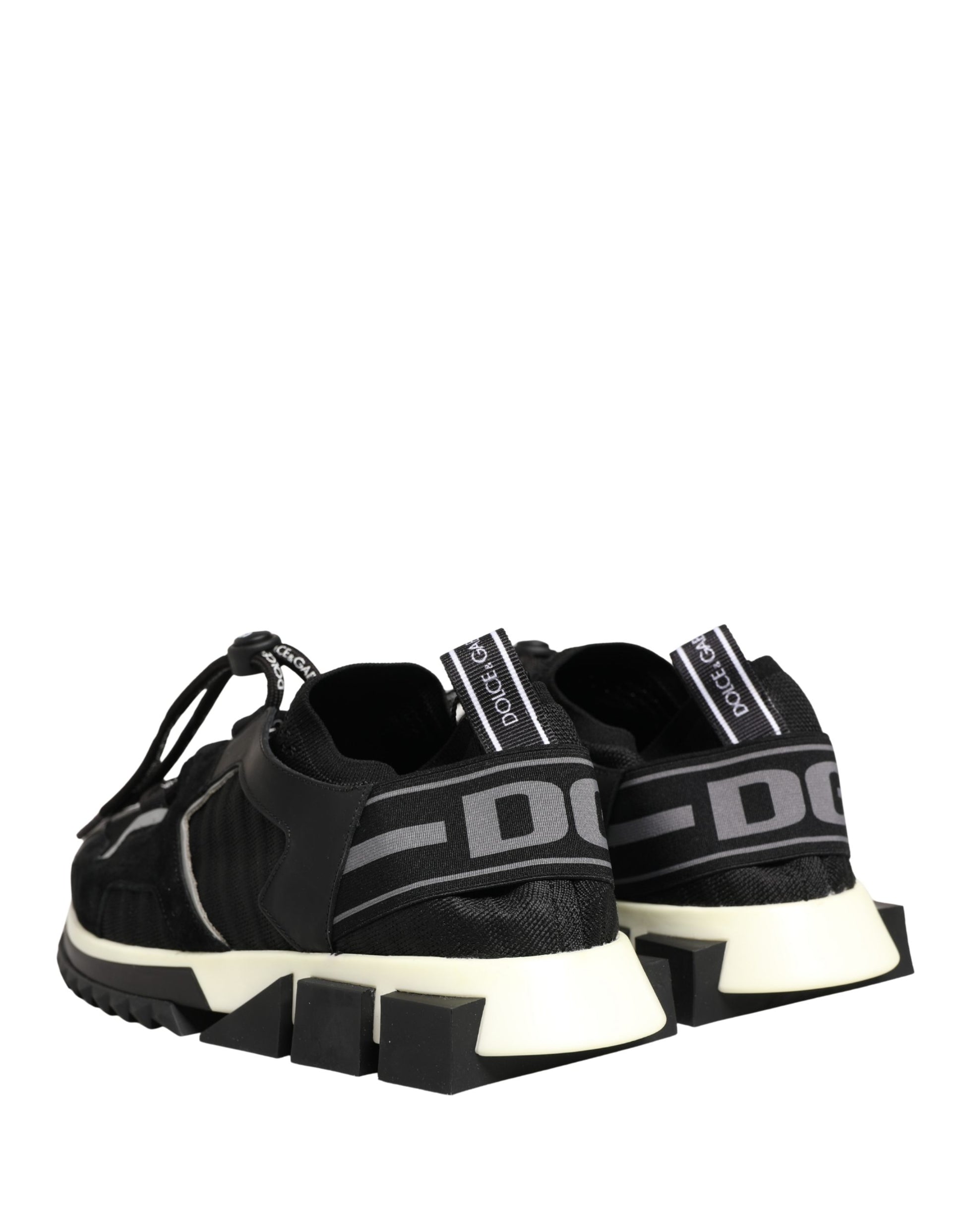 Pair of black mesh sneakers with white soles, featuring the Dolce & Gabbana logo