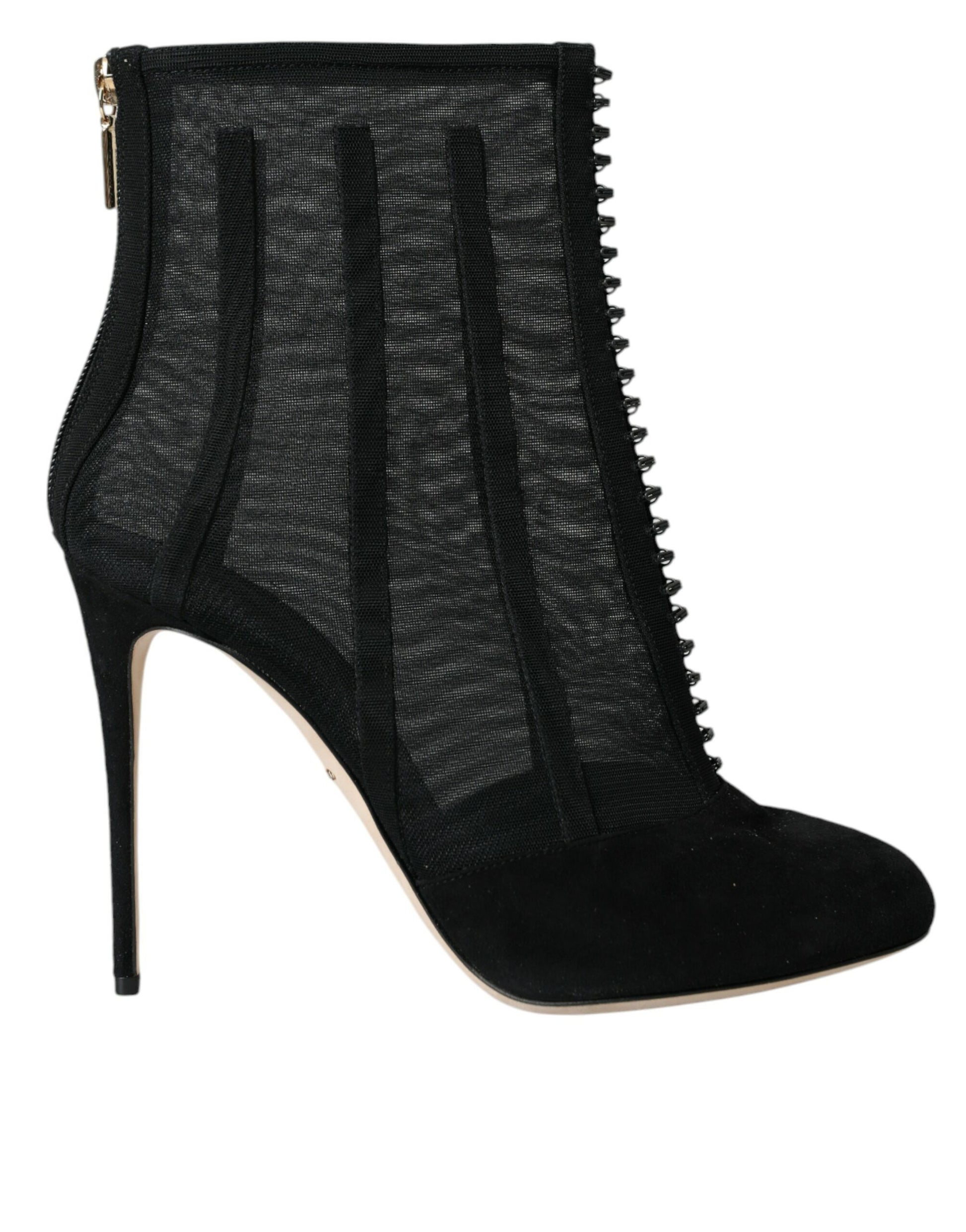 Black suede knee high boots with zipper detailing and a pointed toe