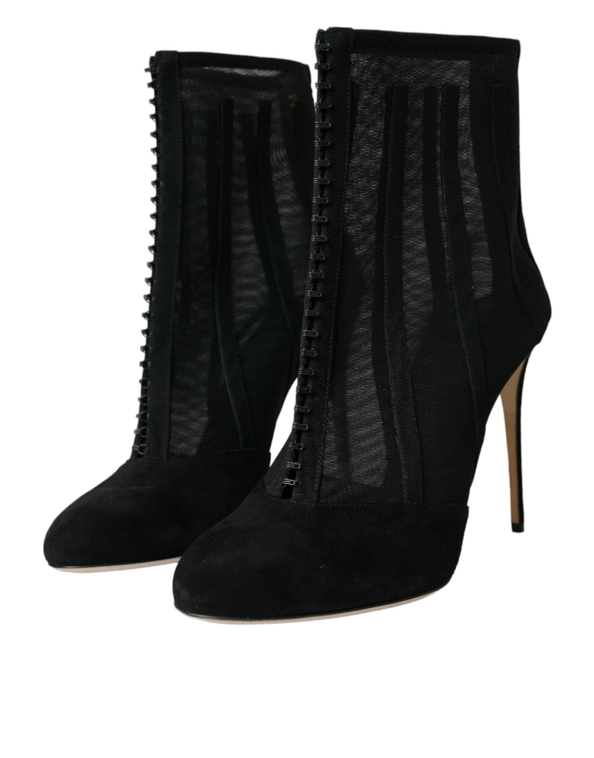Pair of black knee high boots with lace up detail and heels