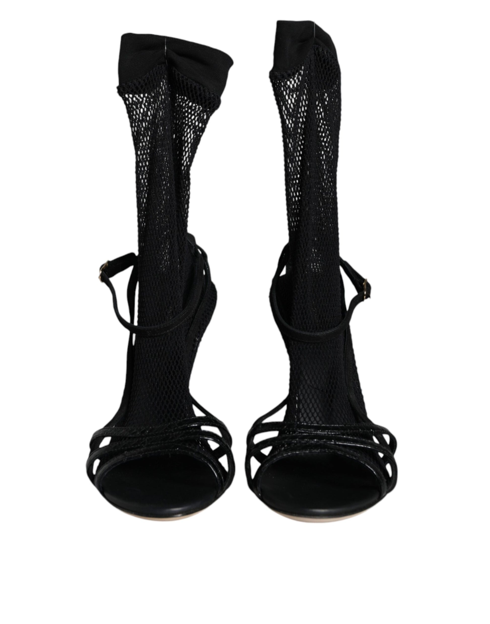 Pair of black high heel shoes with straps