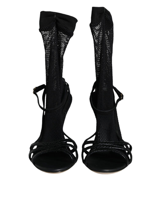 Pair of black high heel shoes with straps