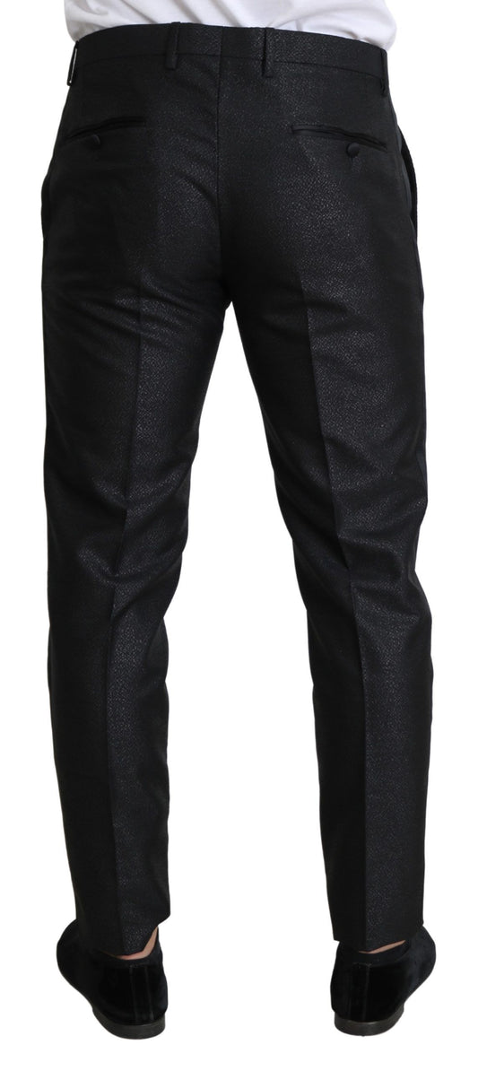 A pair of black metallic skinny trousers with a glittery texture