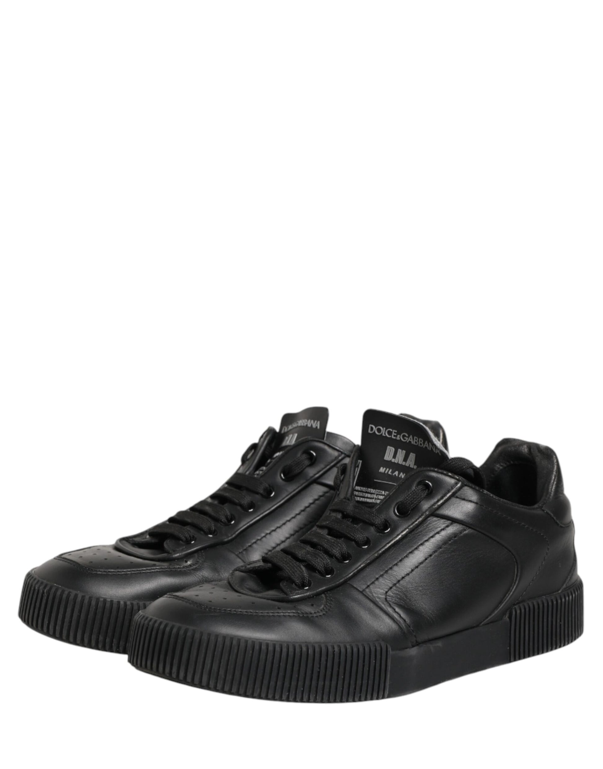 Black sneakers with white soles
