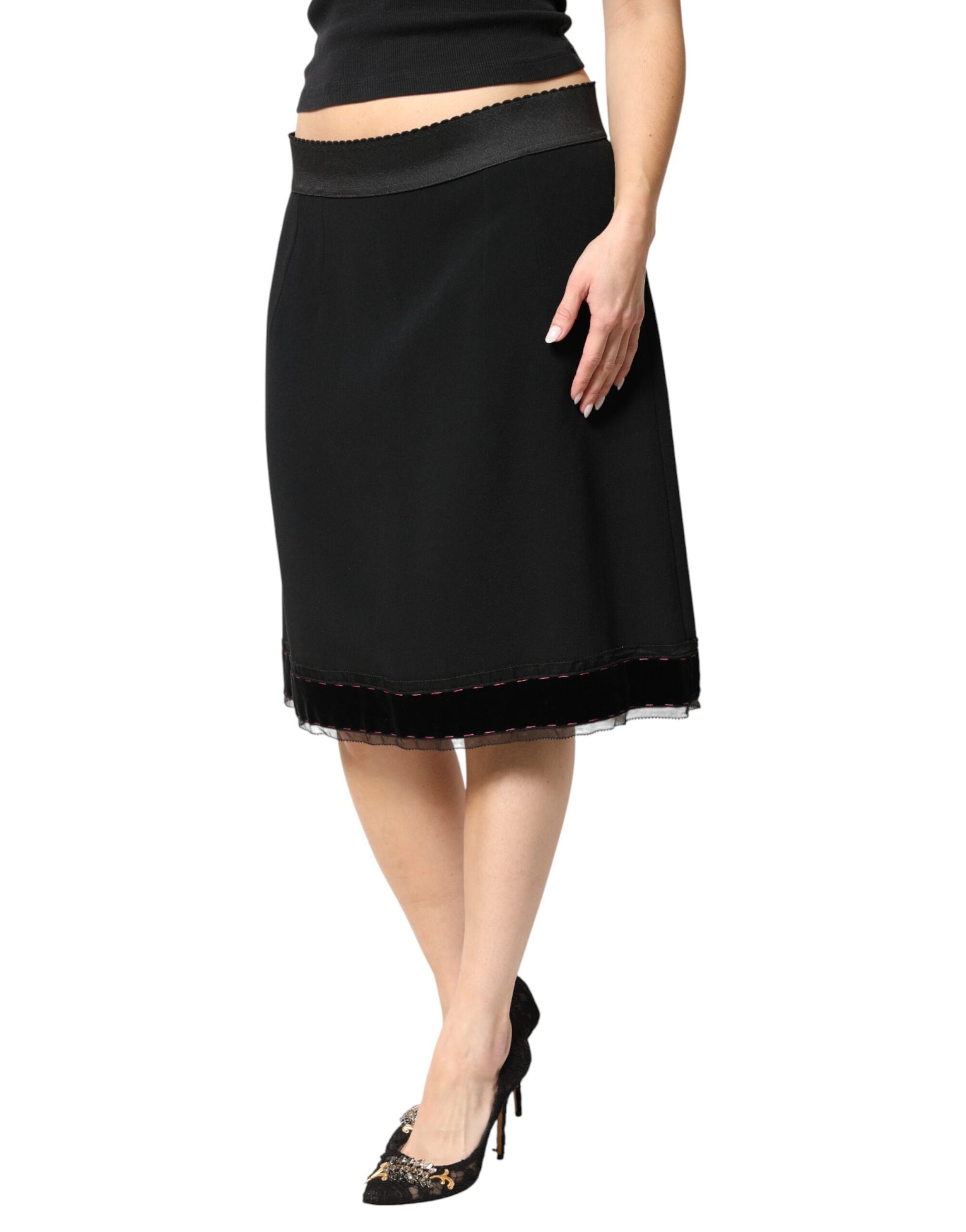 Long black skirt with fringe detailing