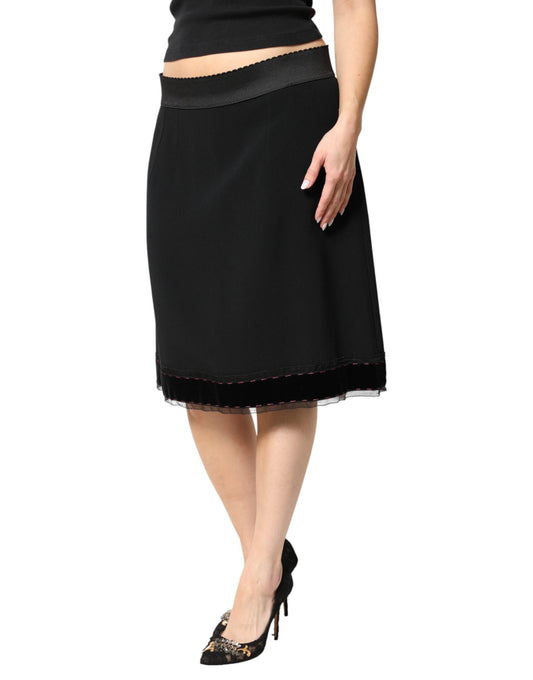 Long black skirt with fringe detailing