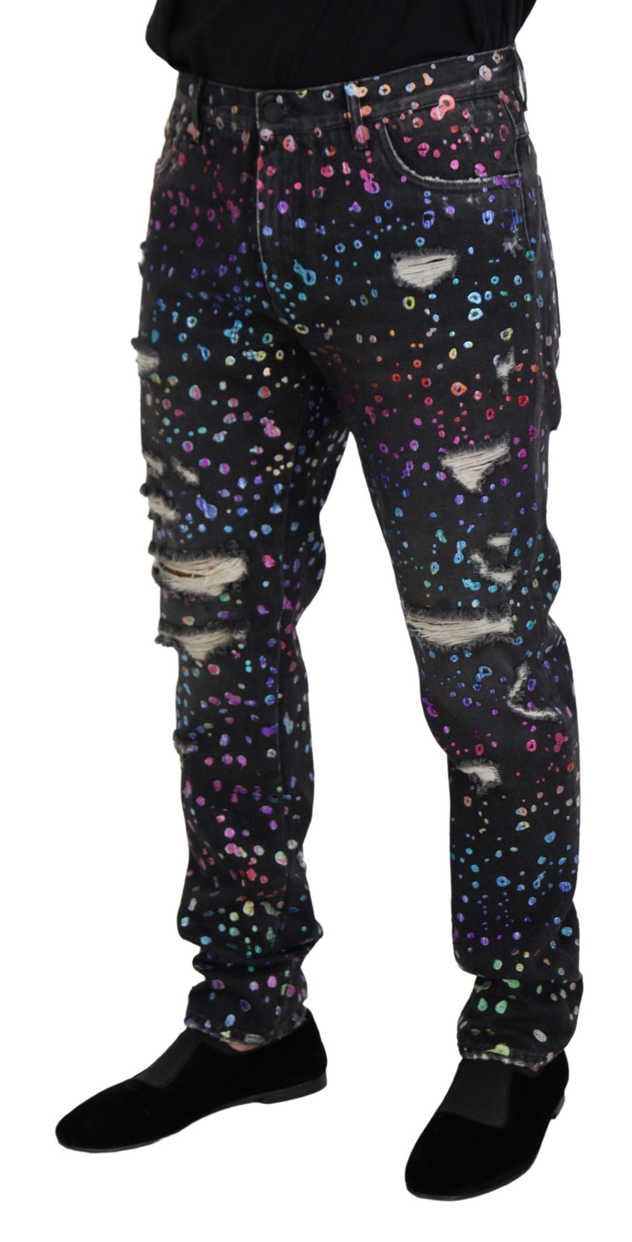 Pair of galaxy print pants with distressed areas