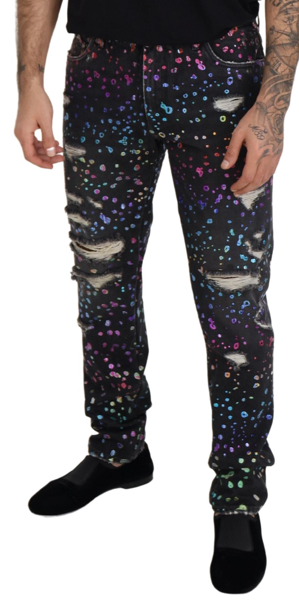 Man wearing colorful pants with a galaxy print