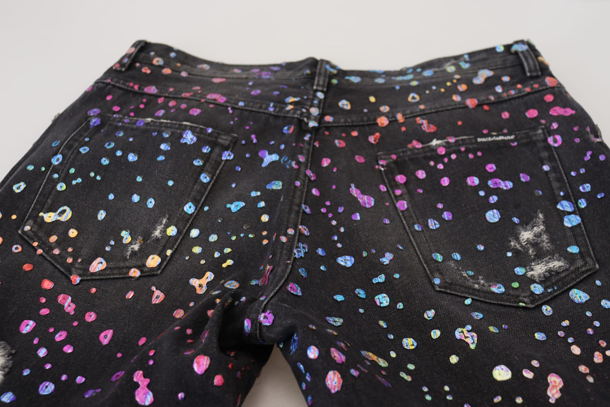 Pair of jeans with colorful spots