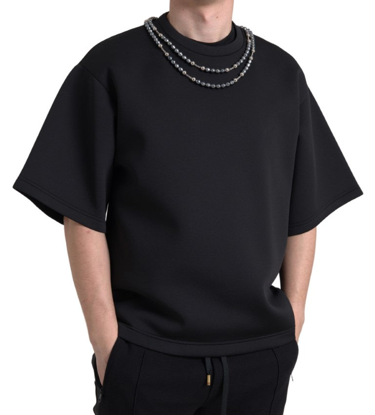 Black oversized t-shirt with long sleeves and a high neckline