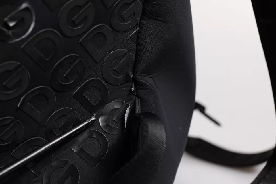 Black backpack with white lettering