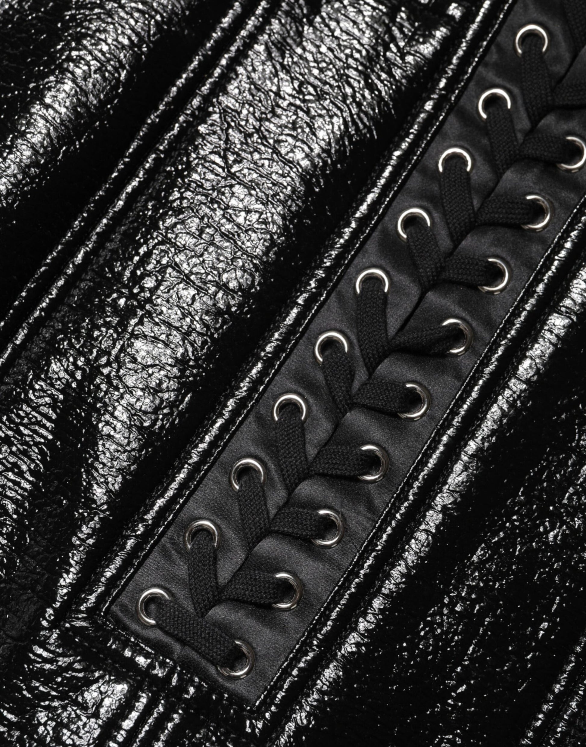 Black leather jacket with metal studs on sleeve