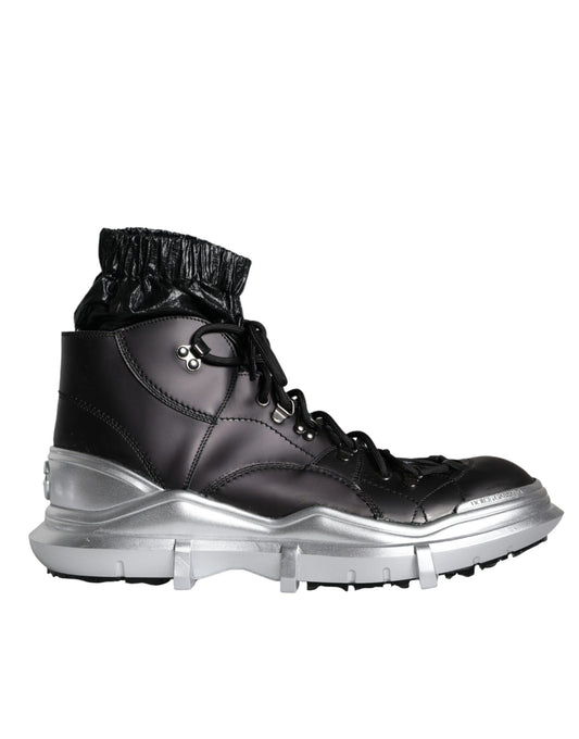 Black boot with silver laces and white sole