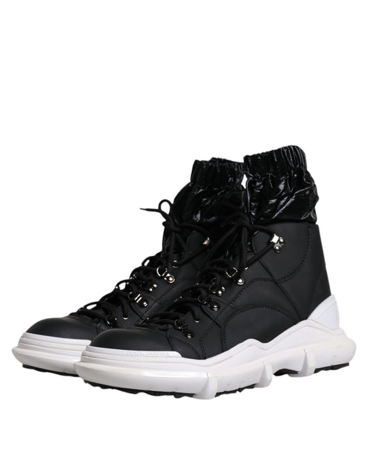 Black and white high top sneakers with laces and a black zipper on the side