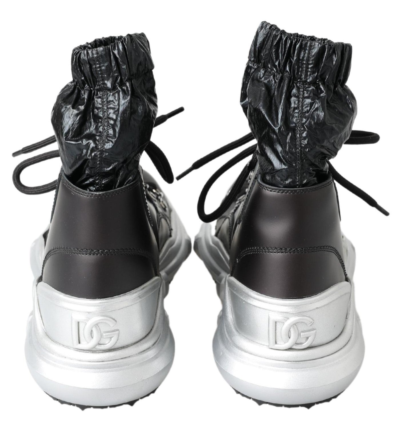Pair of sneakers with black laces and a logo on the side