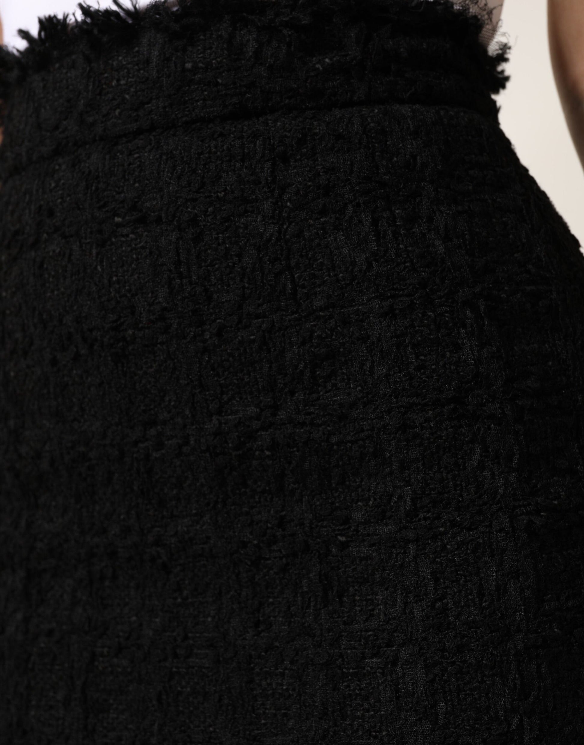 Black fabric item on display