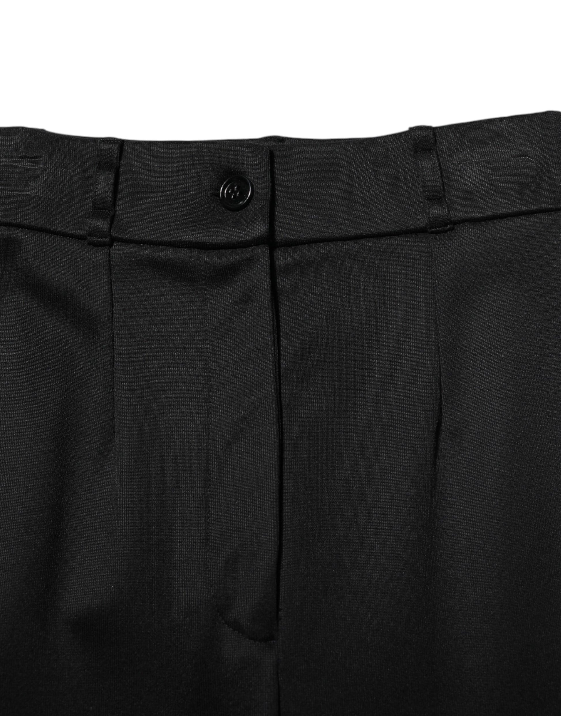 Black suit pants with a patterned design on the front