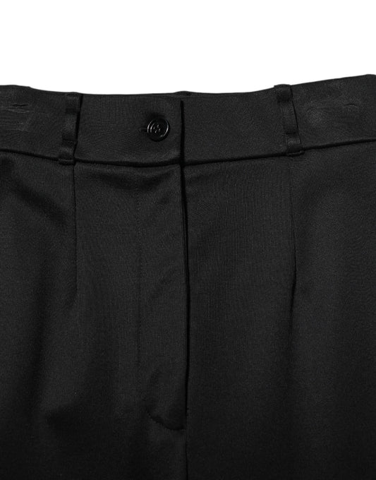 Black suit pants with a patterned design on the front