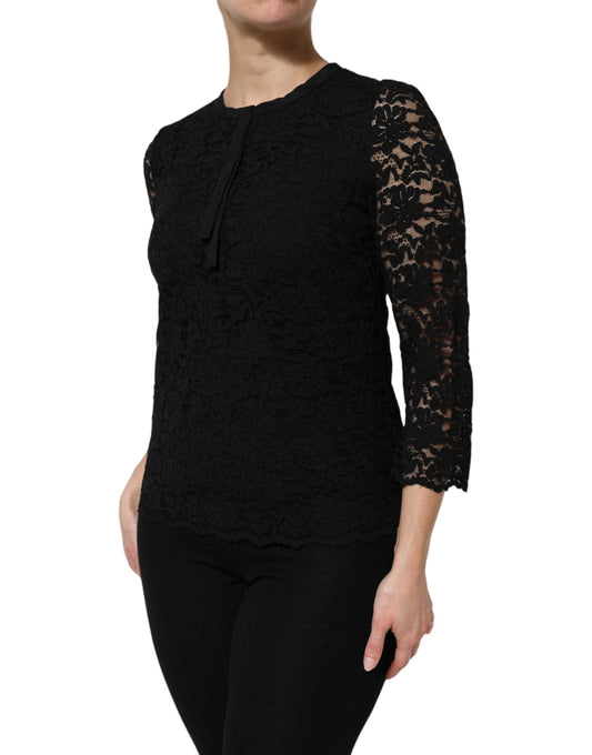 Woman wearing black lace top
