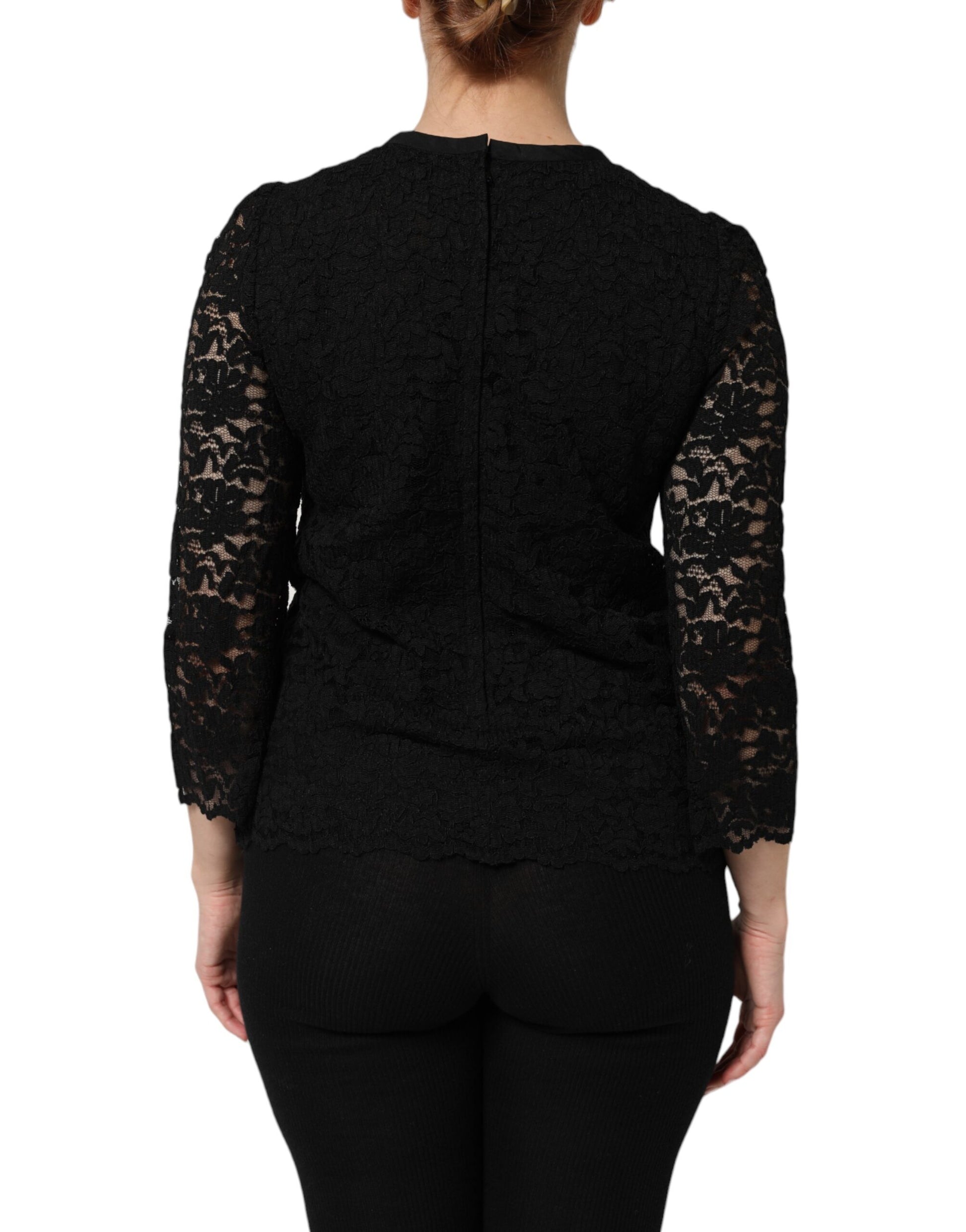 Black lace back top on woman