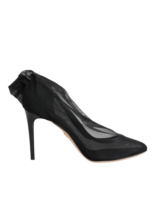 Black high heel shoe with a snake skin texture on the toe