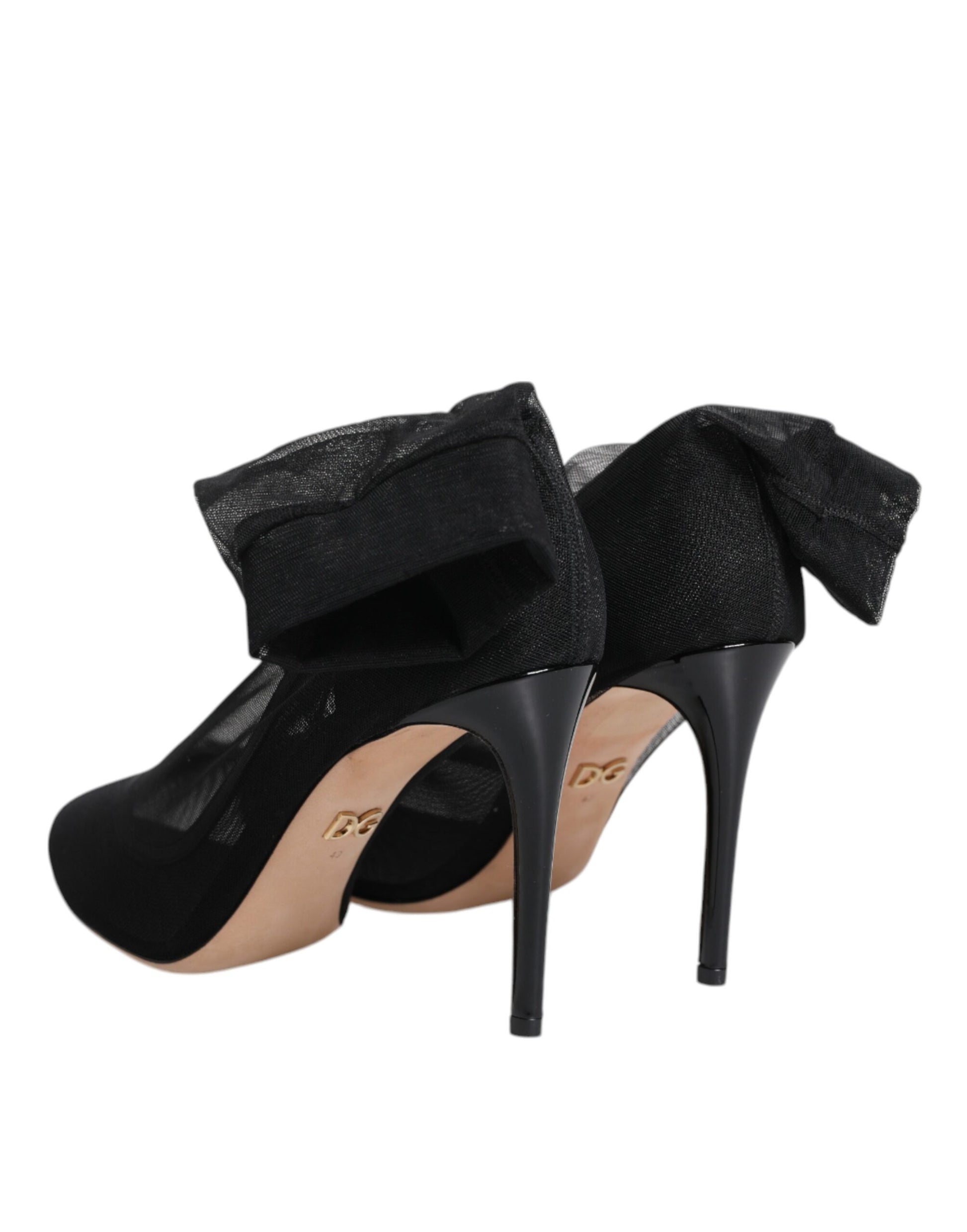 Black high heel shoes with gold accents