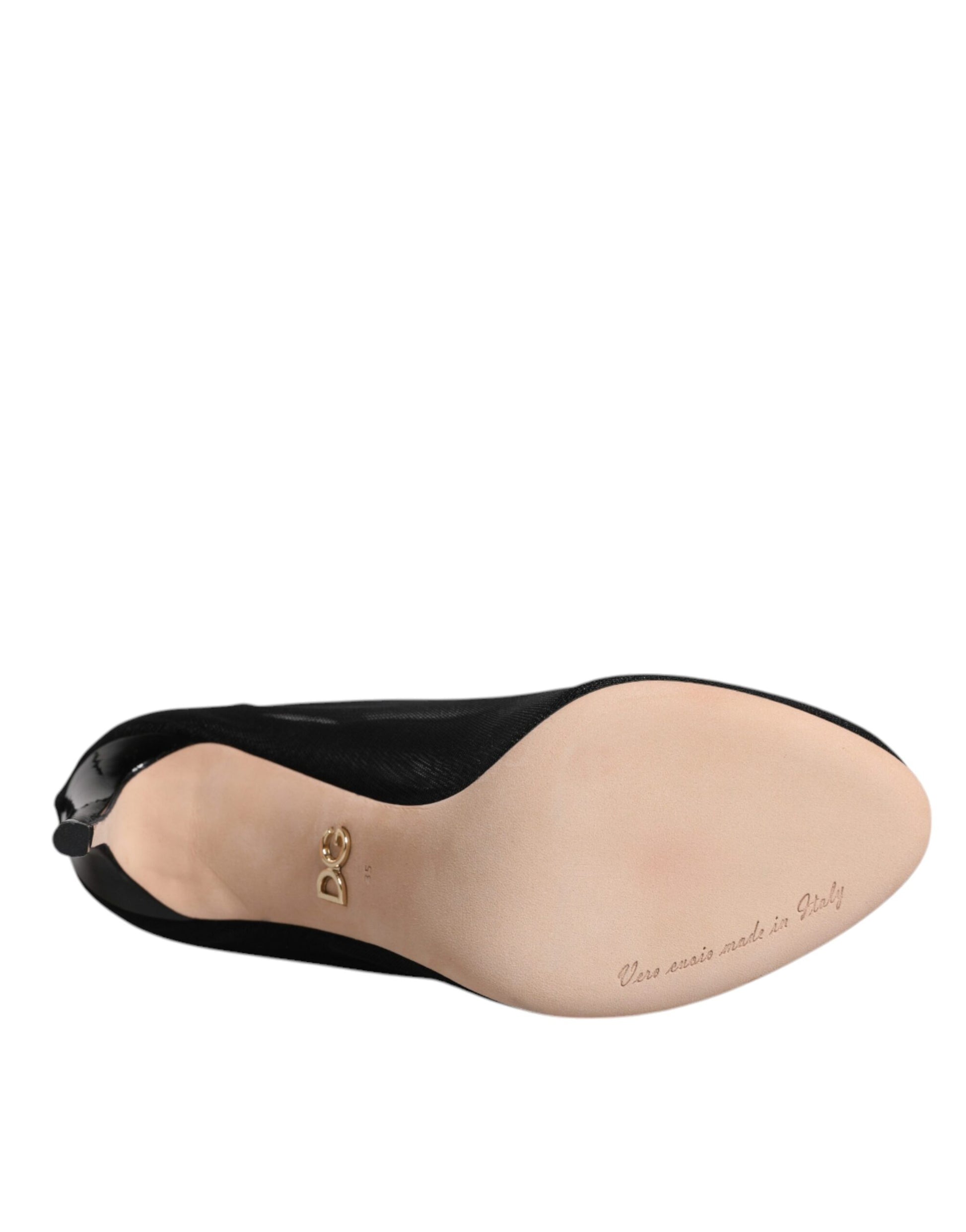 Black shoe with tan toe cap