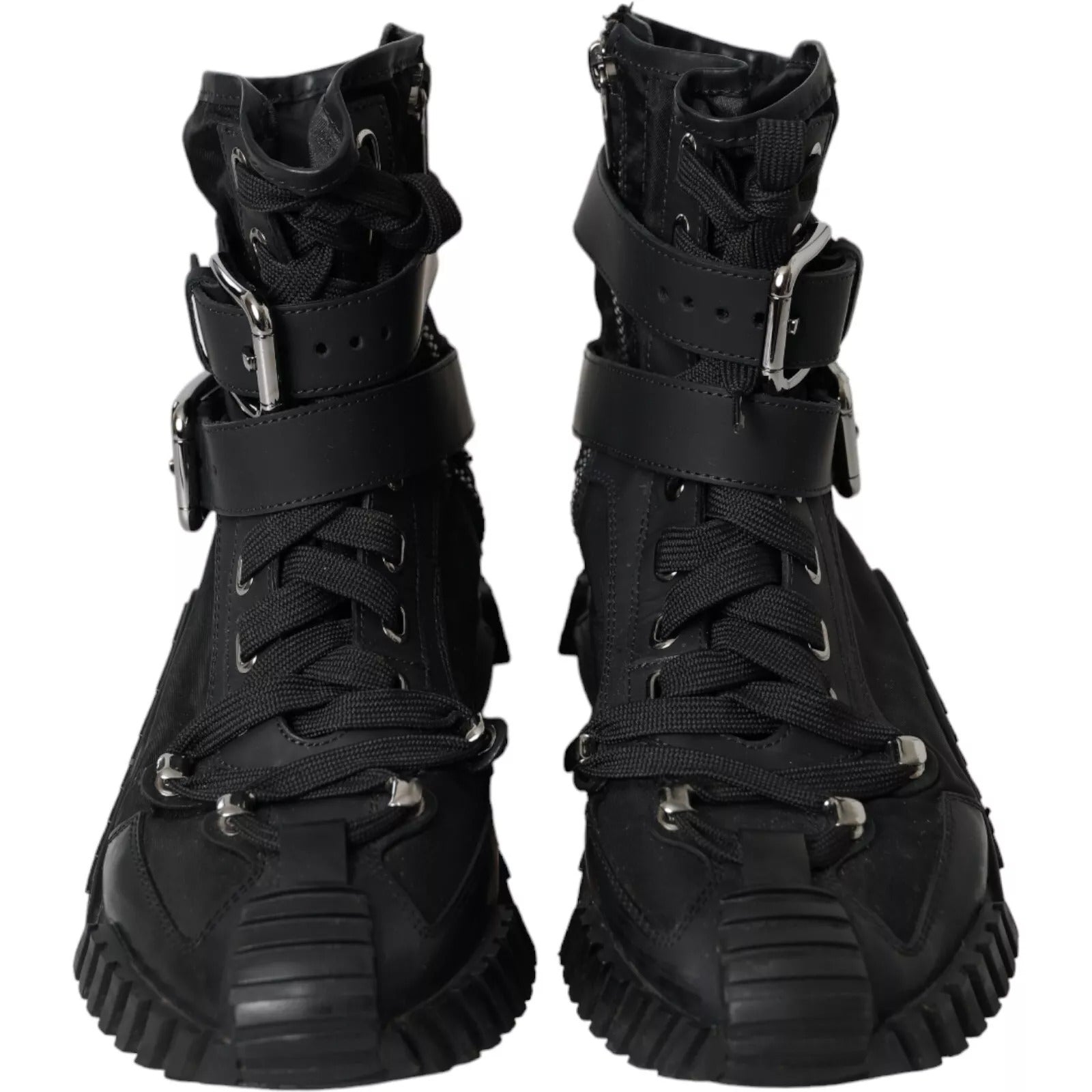 Pair of black boots with laces and straps