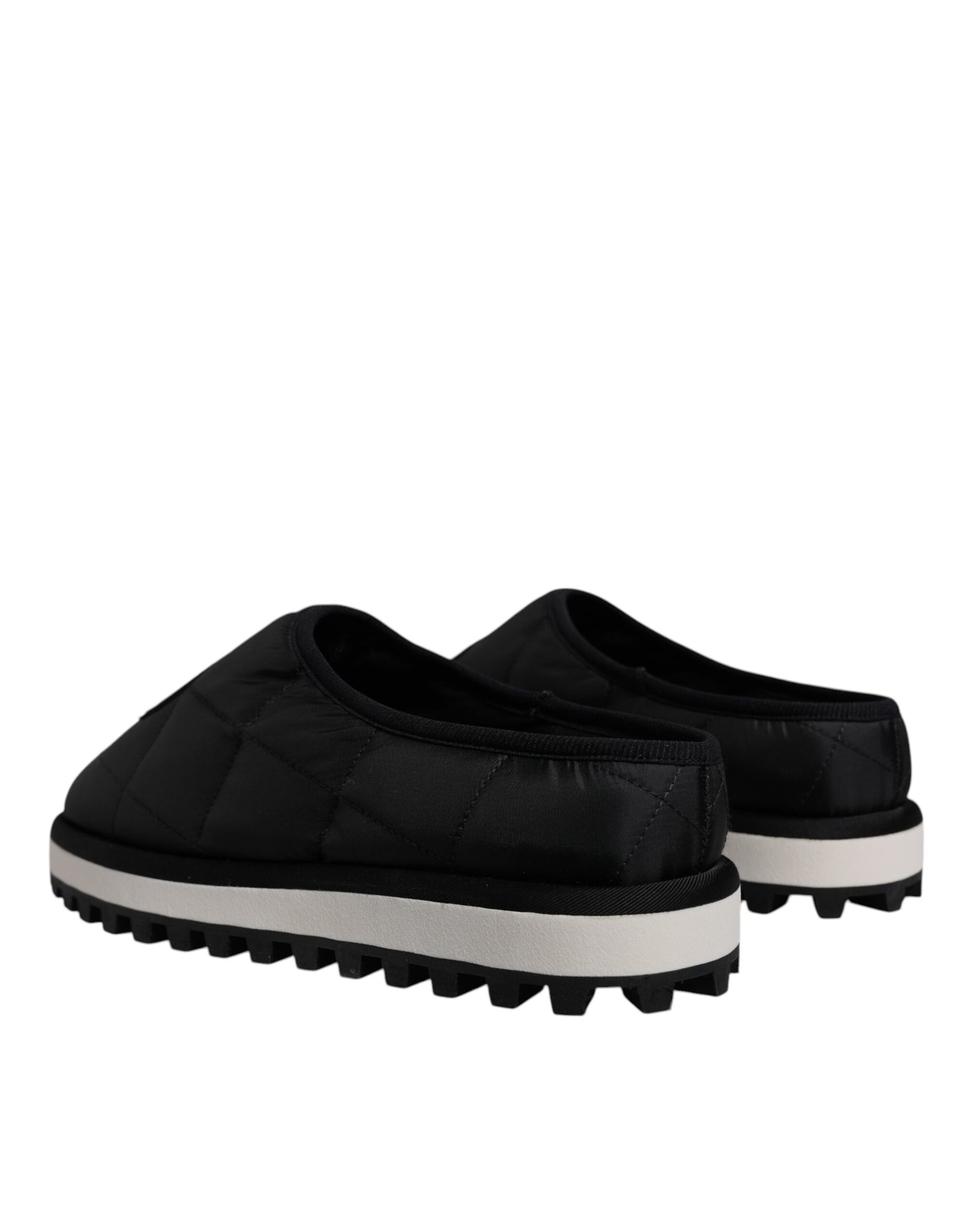 Pair of black shoes with white soles