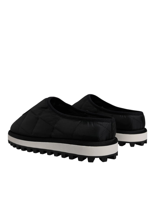 Pair of black shoes with white soles