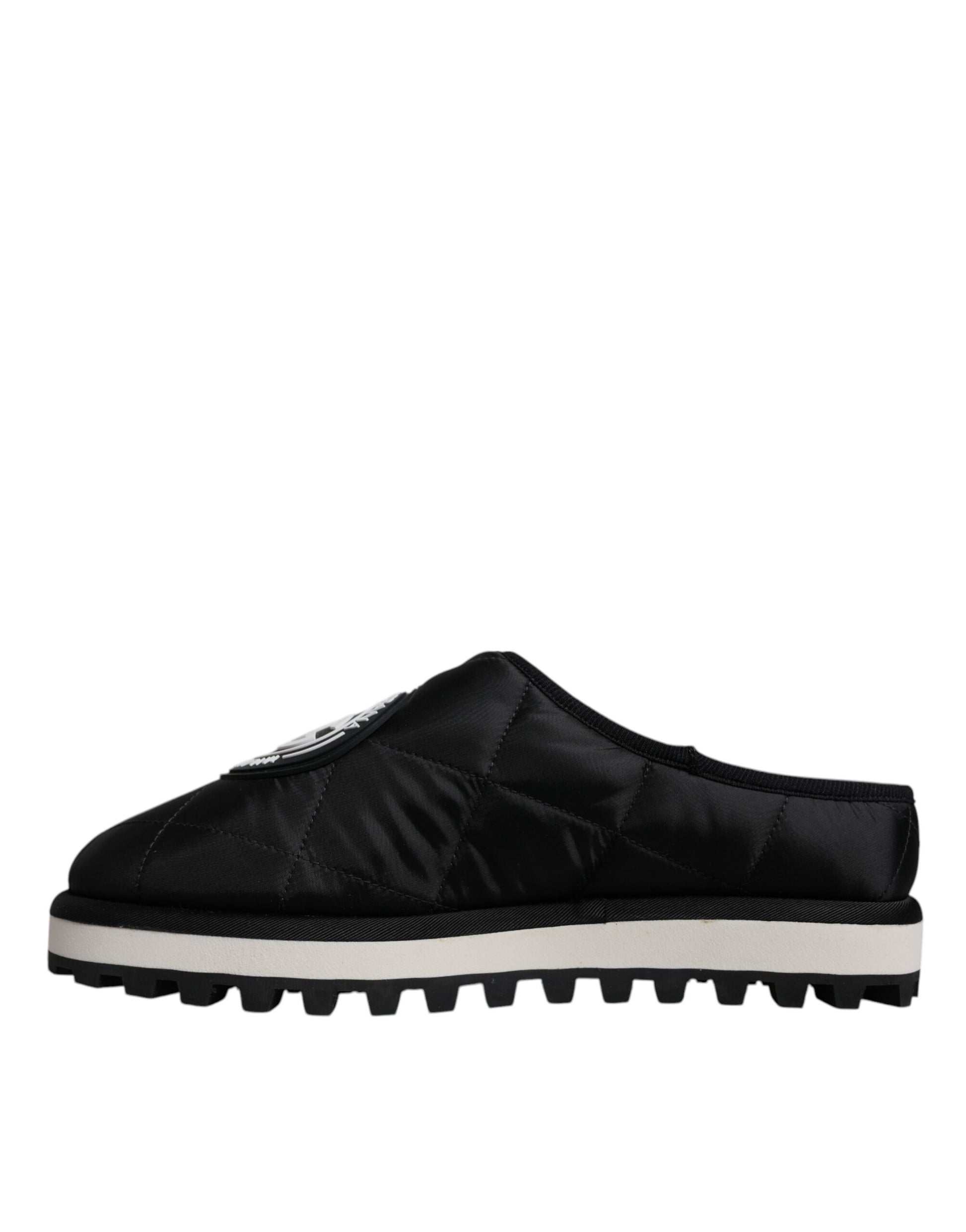 Black slip on shoes with white soles