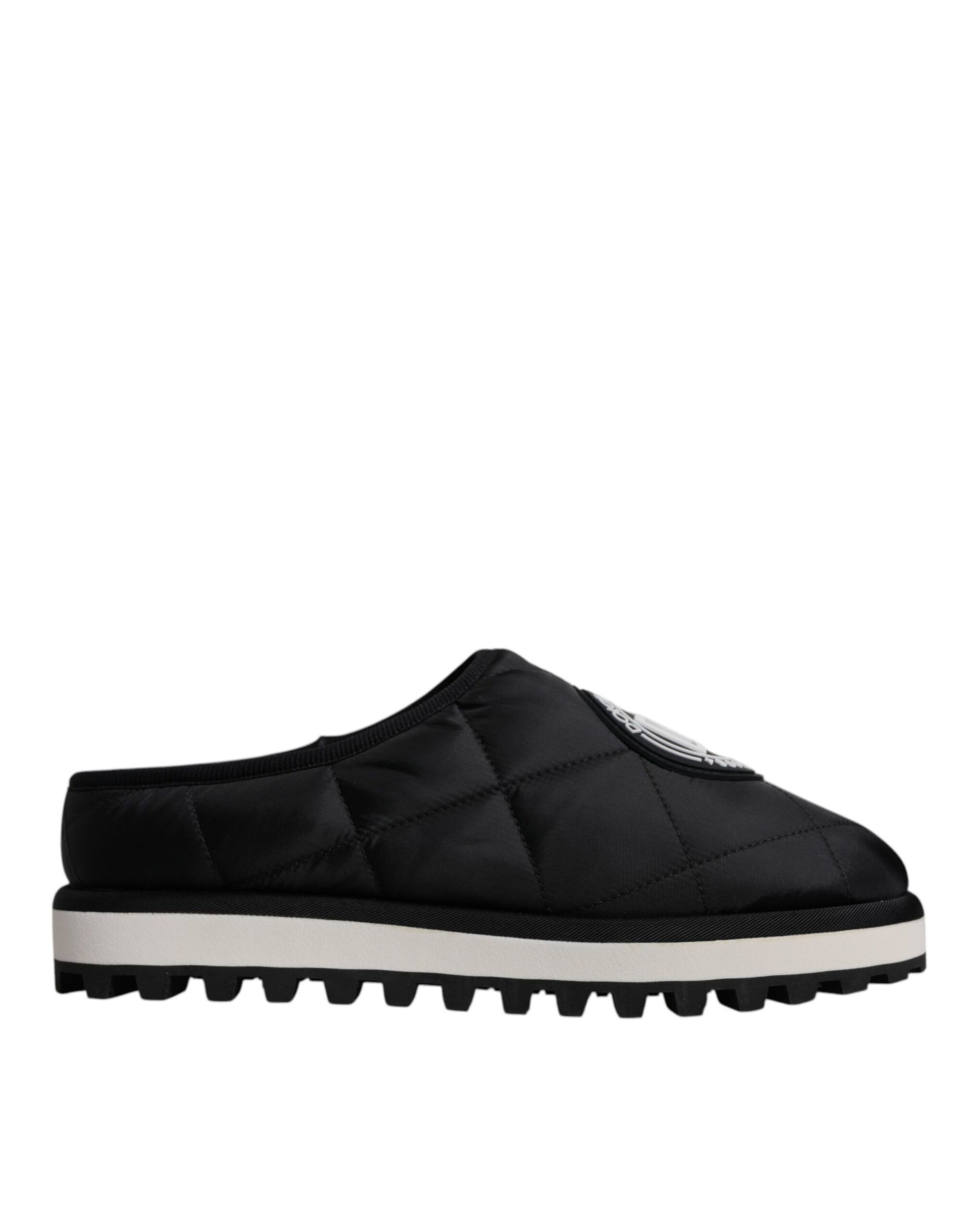 Black slip on shoes with white soles
