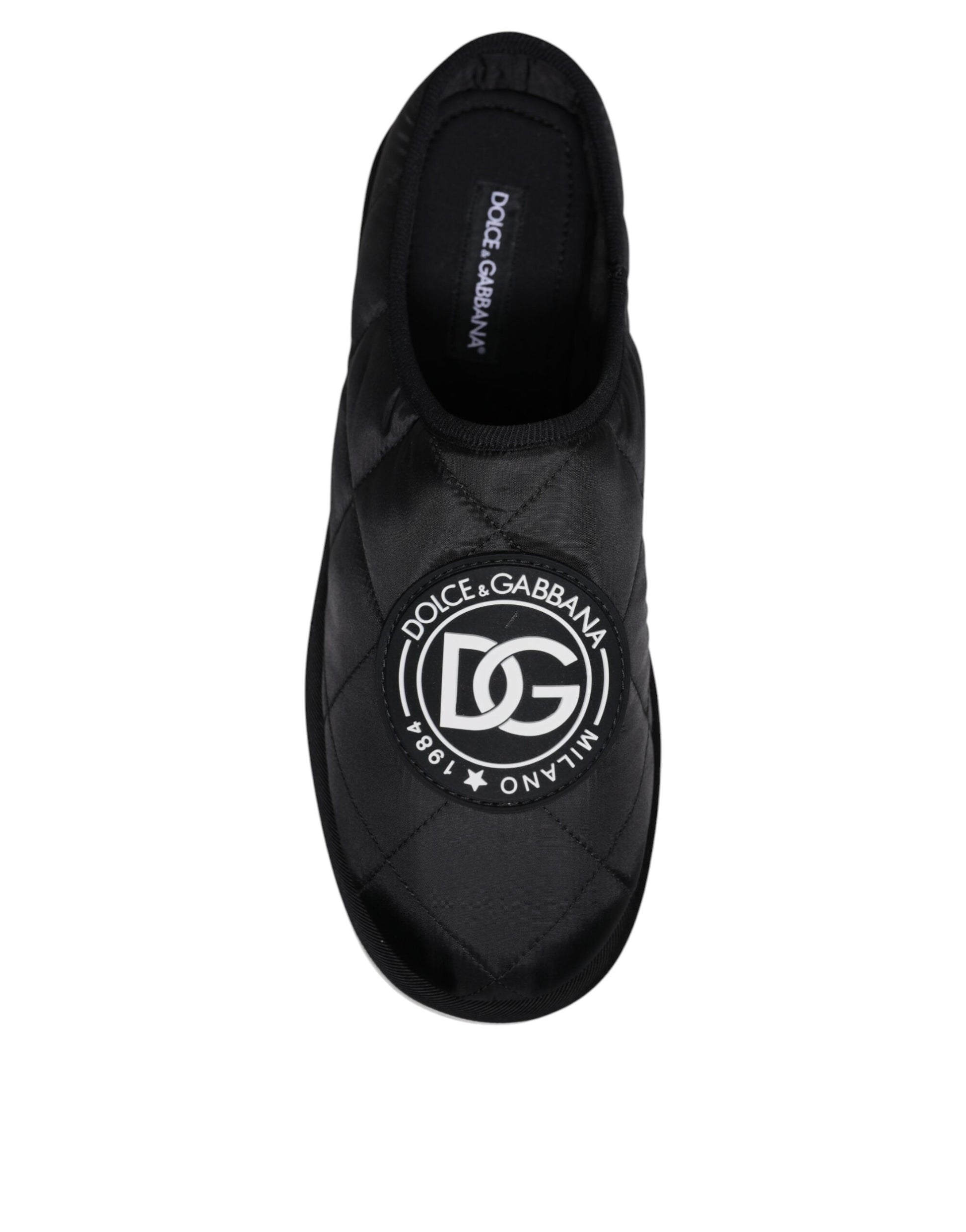 Black slipper with white logo on side