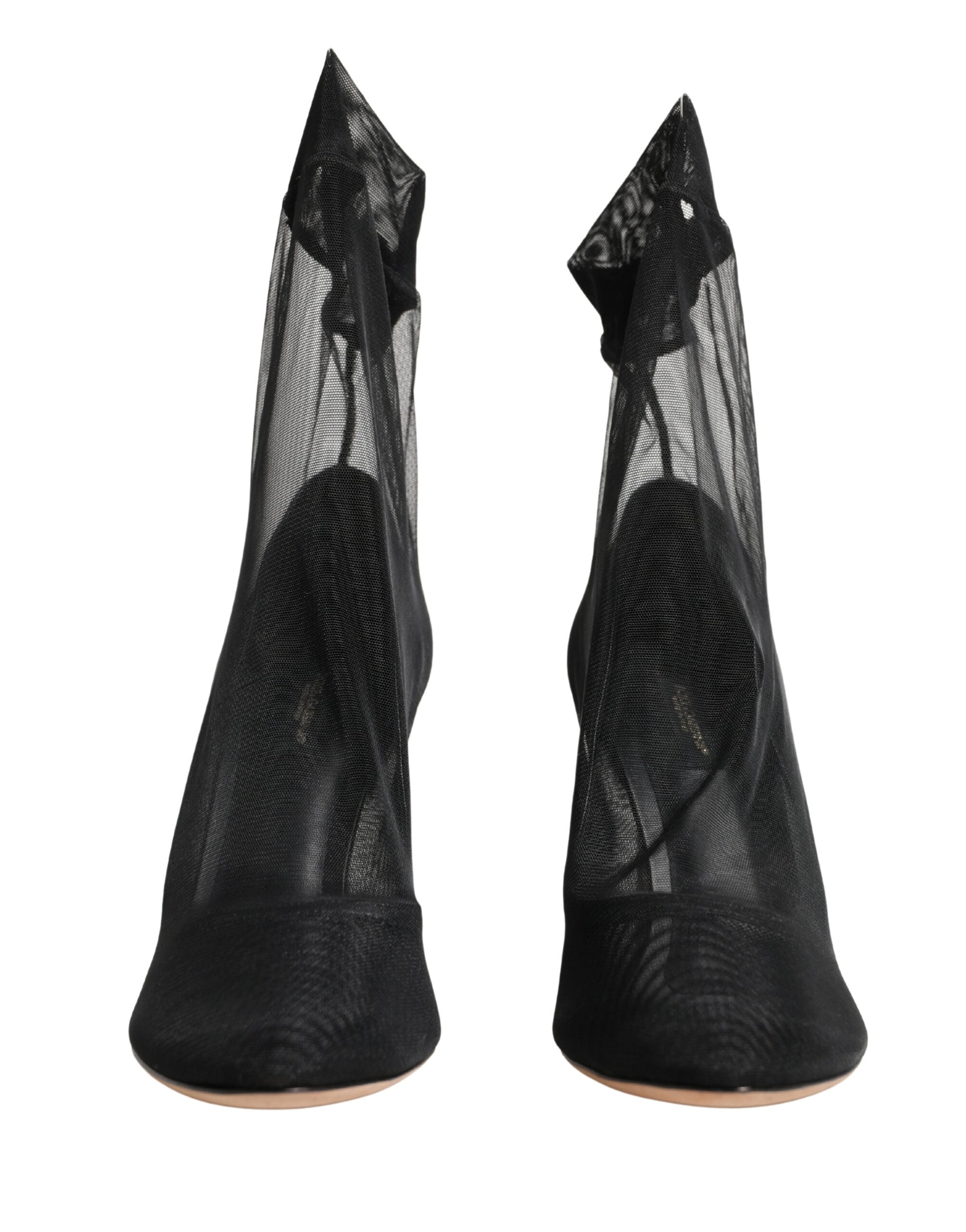 Pair of black high heel shoes with mesh detailing