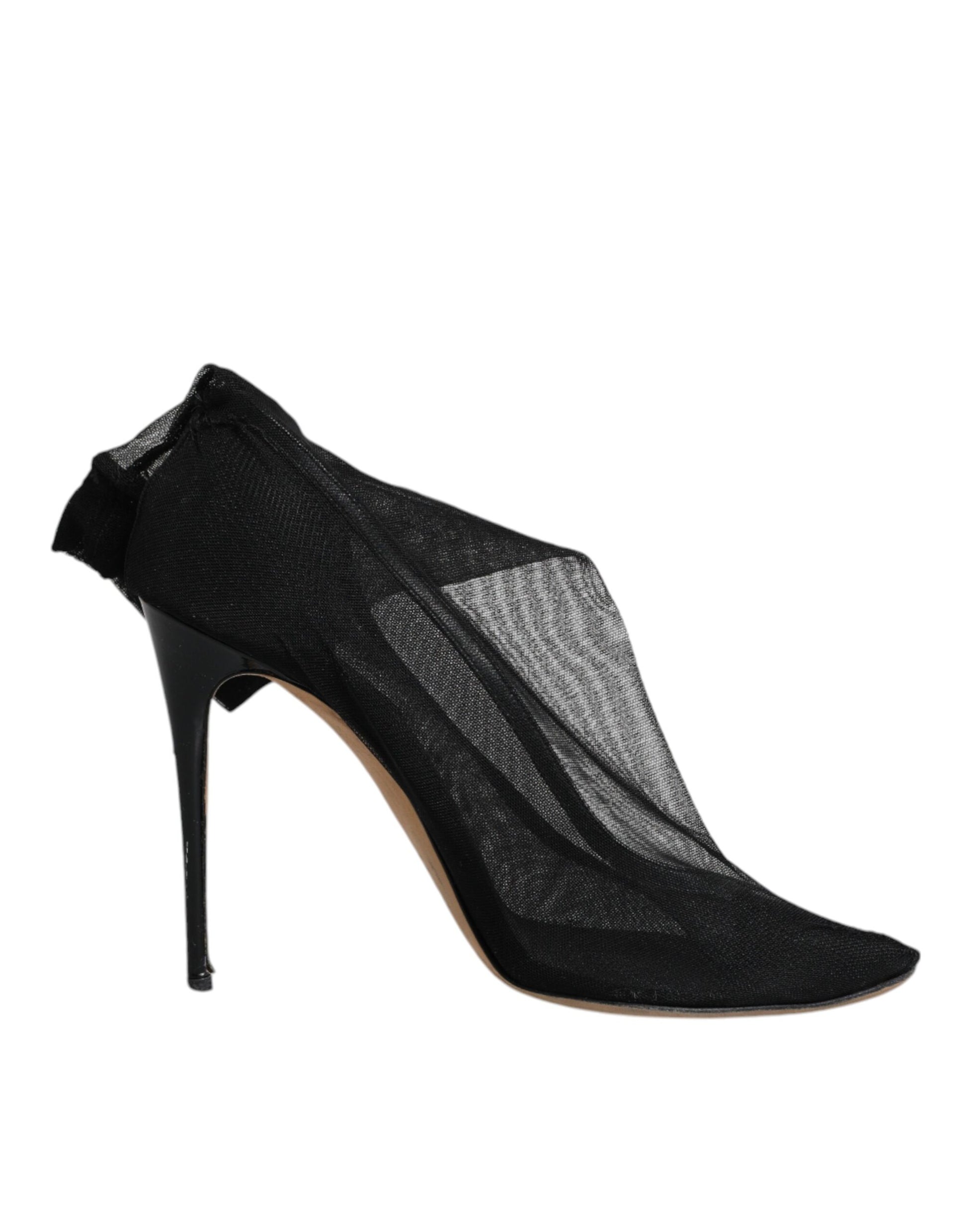 Black high heel boot with embellishments on side