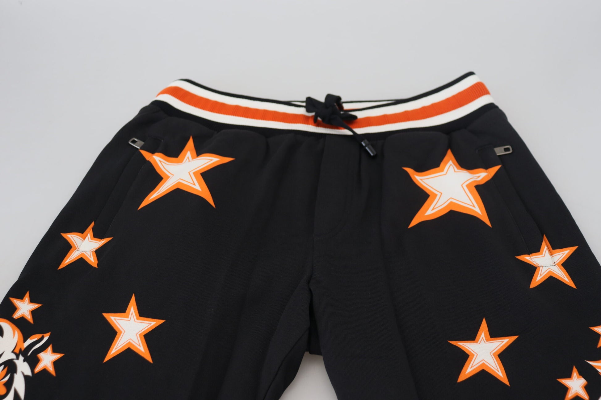 Black shorts with orange stars