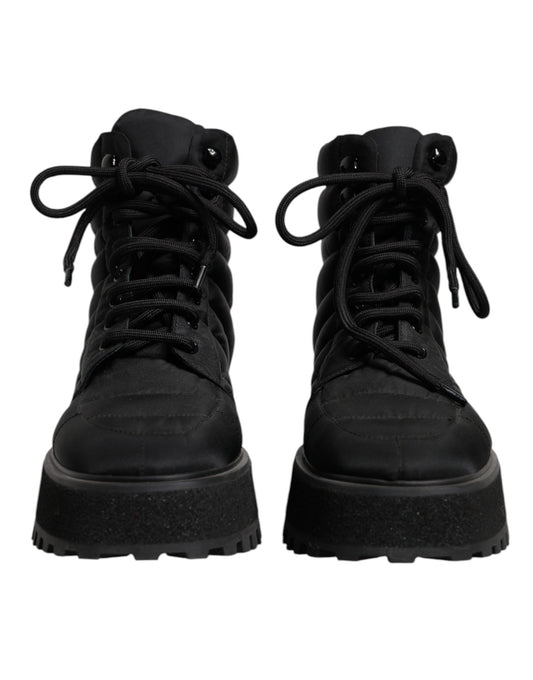 Pair of black boots with laces
