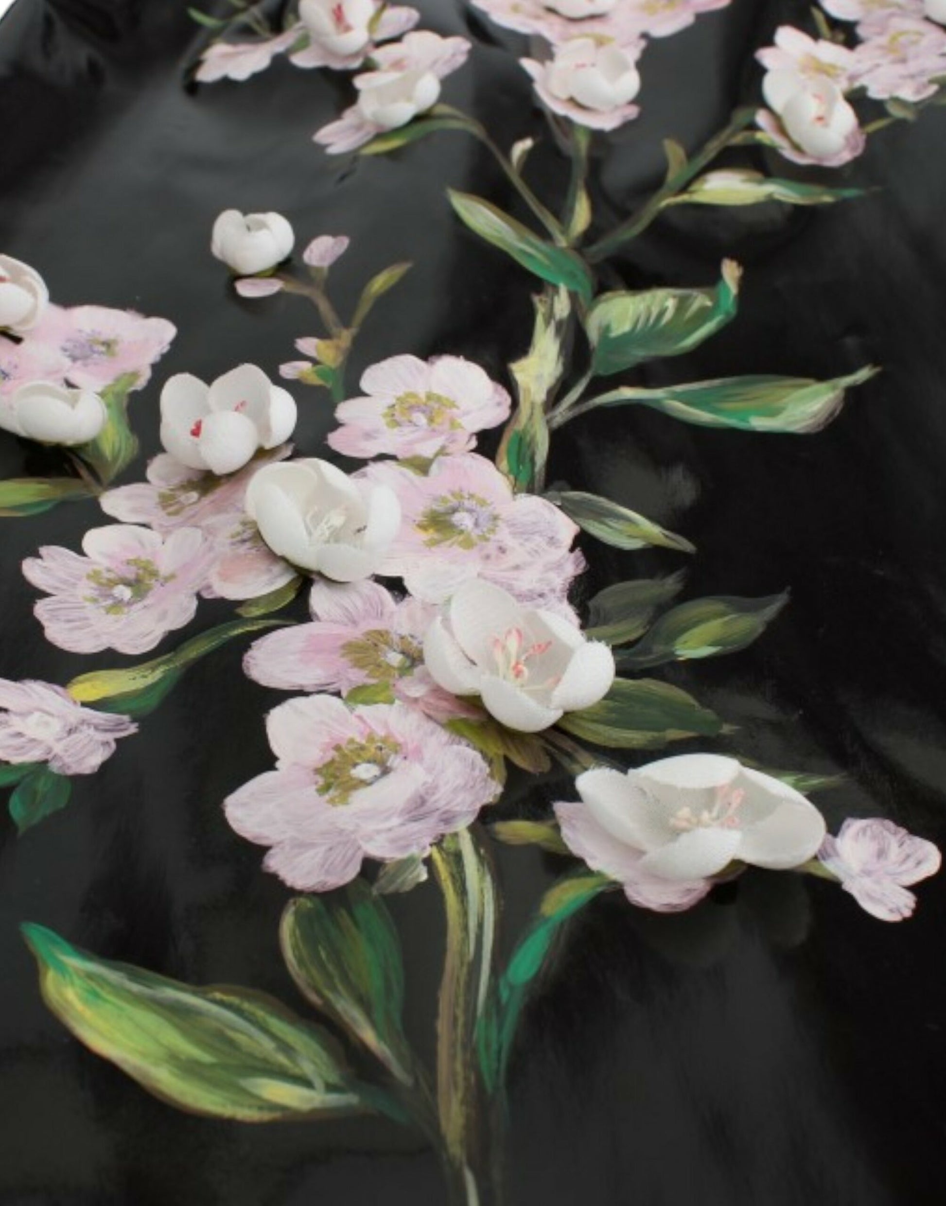 Embroidered floral design on black fabric