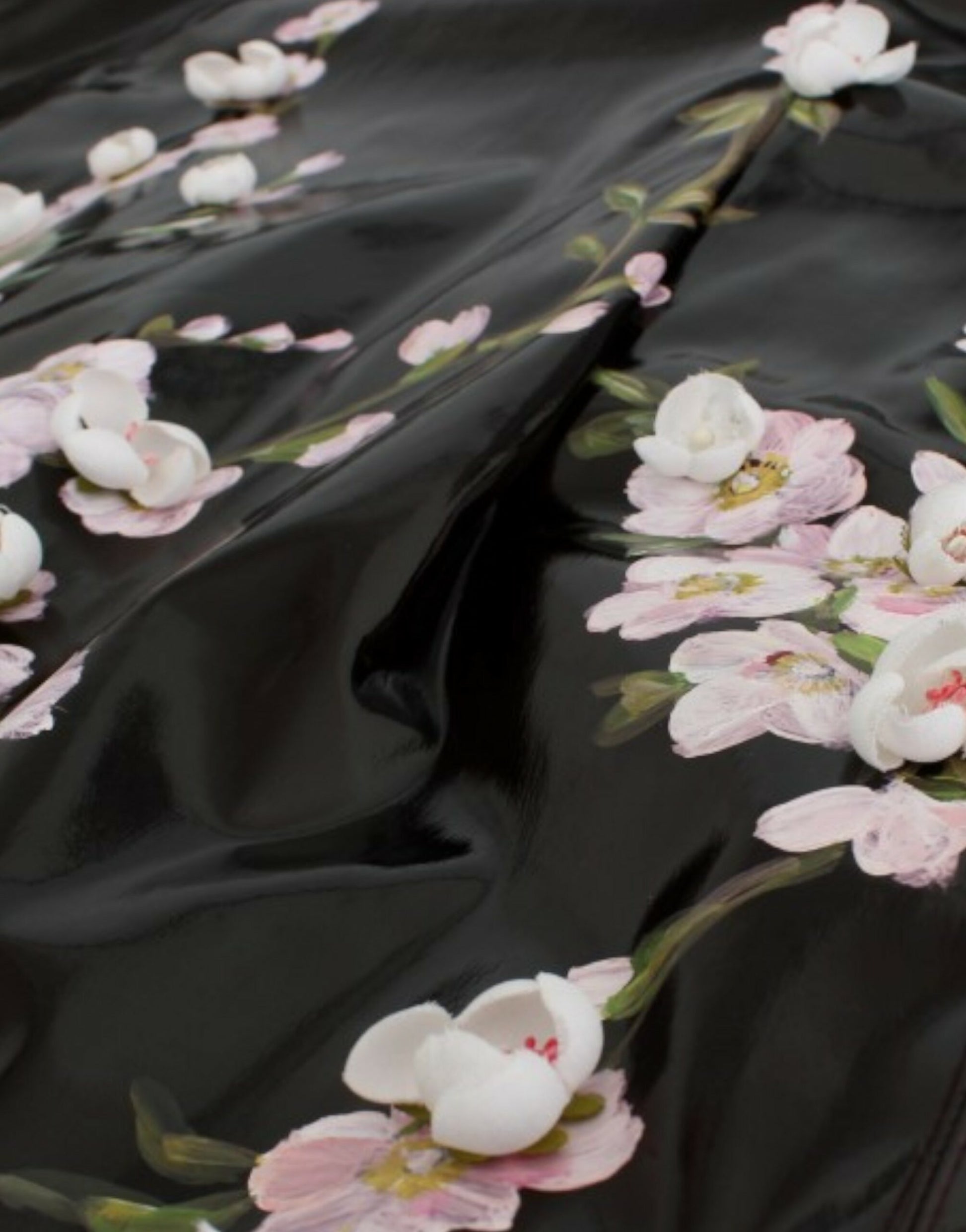 Black fabric with pink flower embroidery