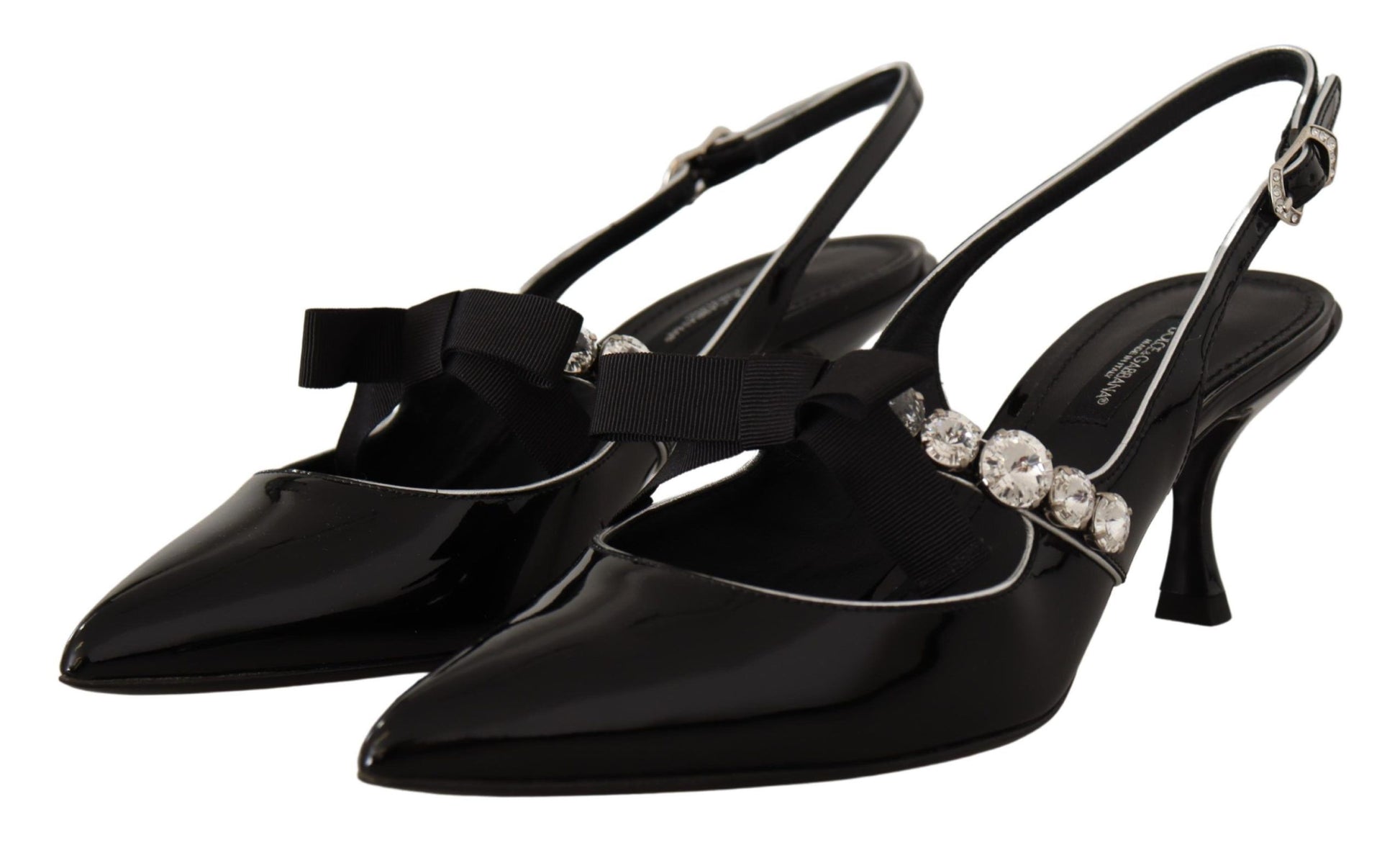 Pair of black high heel shoes with rhinestones and straps