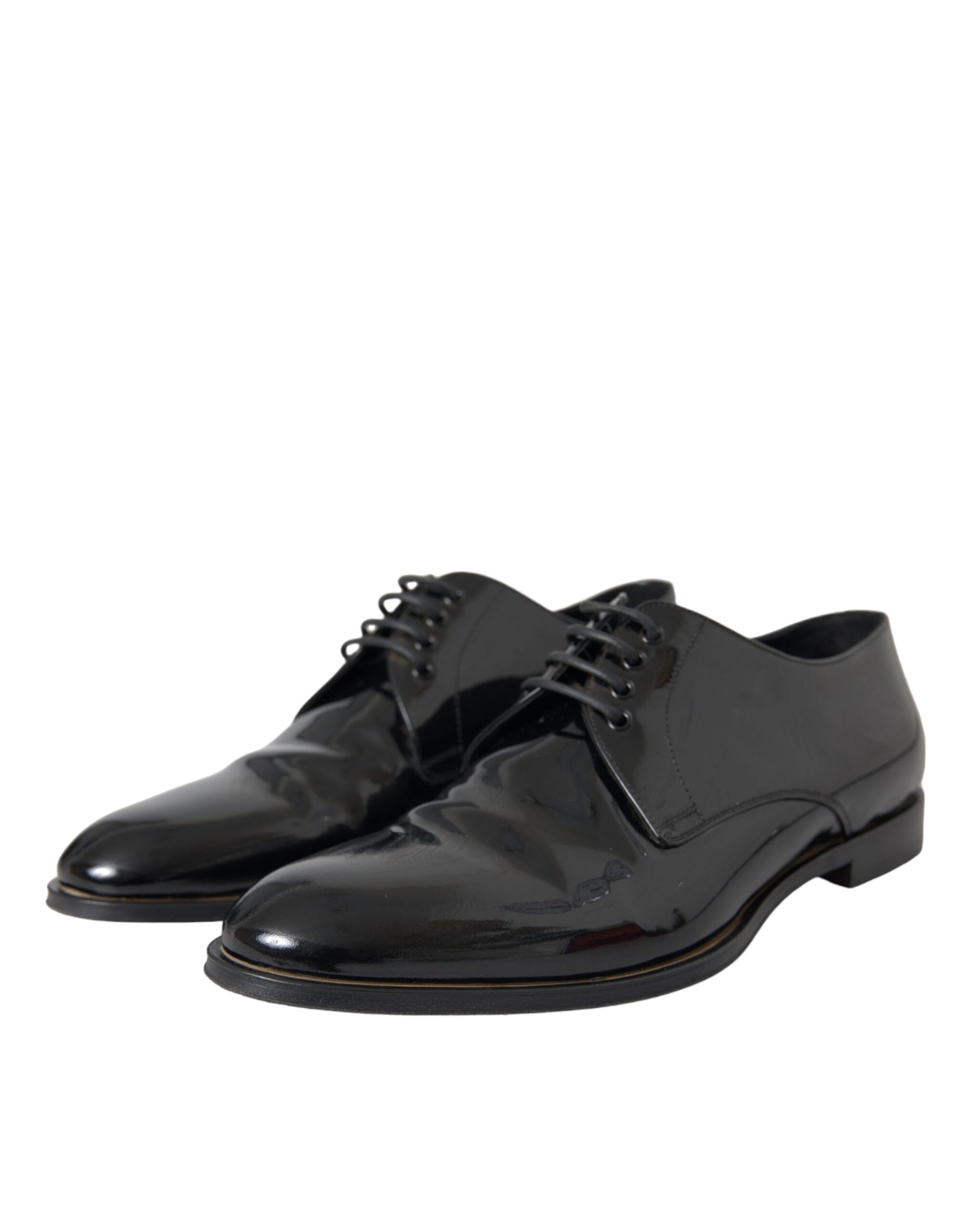 Pair of black patent leather dress shoes with laces and a small heel